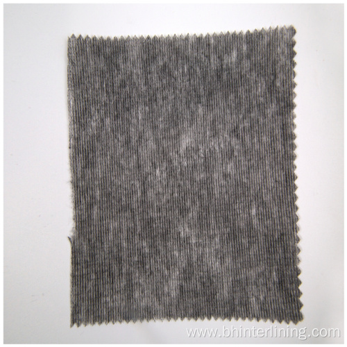 Nonwoven double dot stitched garment interlining